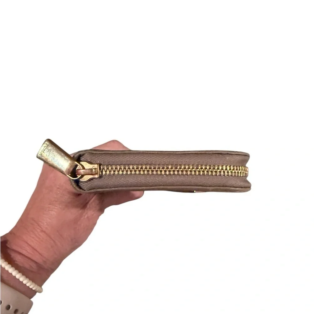 Furla Gold Zip-Around Wallet Sleek Design